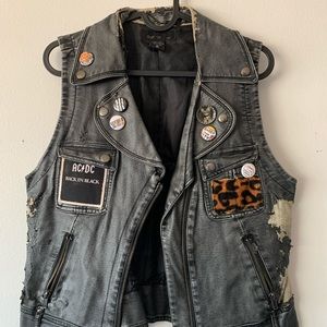 Distressed custom vest with patches & buttons.